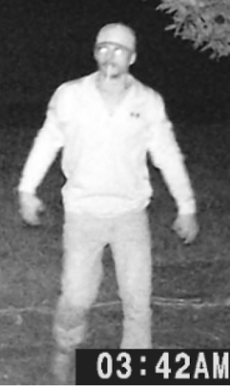 Second black and white camera footage snapshot of suspect taken 3:42AM.
